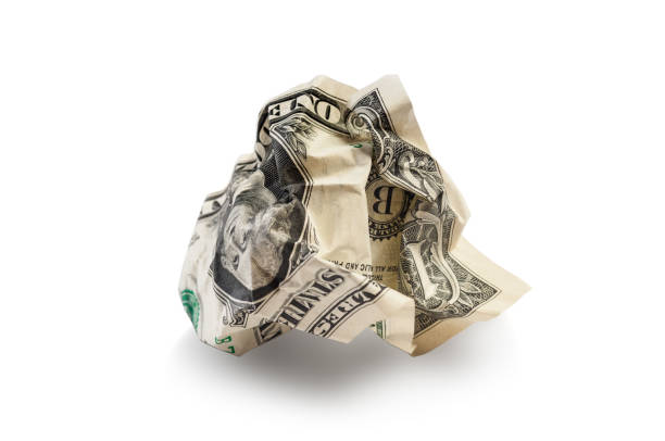 istock crumpled wrinkled dollar isolated on white 1140973980