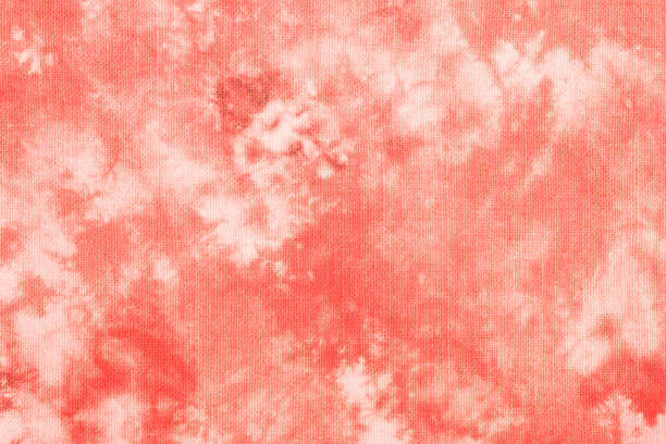 tie dye cotton texture Abstract texture of tie dye cotton fabric coral color design. Coral color tie dye cotton texture human interest stock pictures, royalty-free photos & images