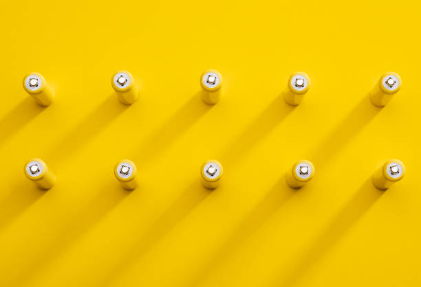 istock Yellow alkaline batteries colorful pattern 1140974696