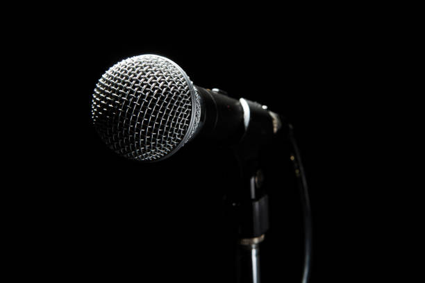 istock Microphone in a Black background. Music and concert concept. 1140978453