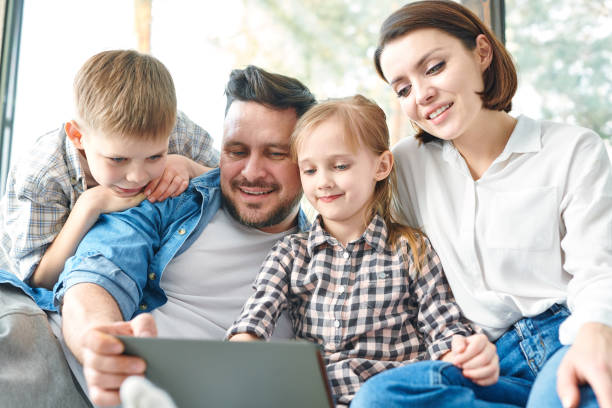 istock Family watching movie 1140980681