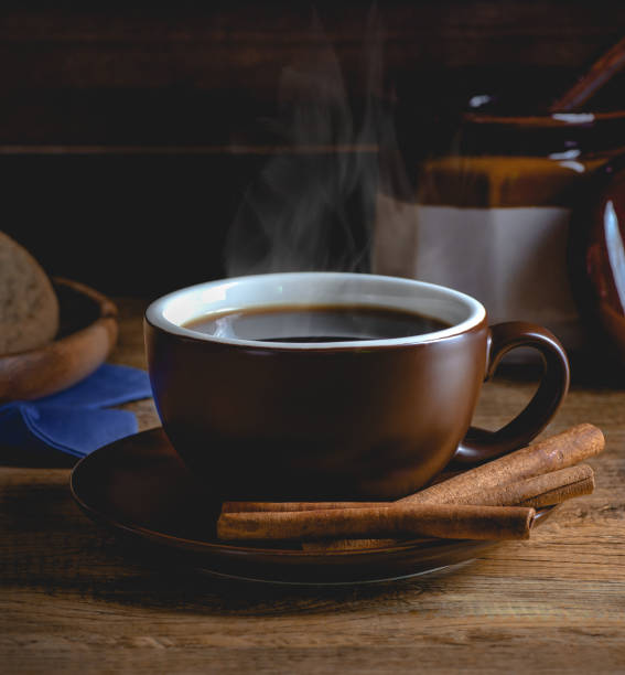 istock Hot Cup of Coffee on a Dark Background 1140981646