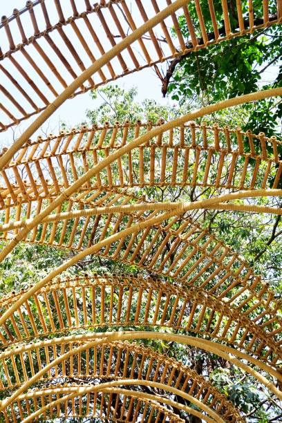 istock Bamboo Arch Over The Walkway Along A Building 1140981968