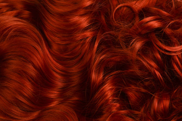 istock Red hair background. Curly red hair. 1140986261