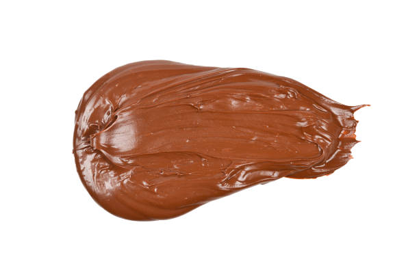 istock Chocolate cream background. Space for text or design. Isolated on white. 1140987618