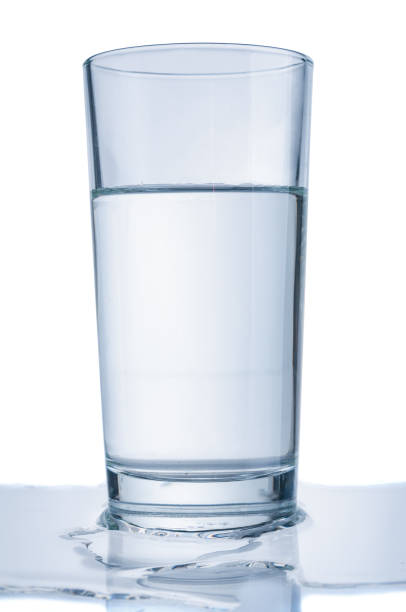 istock Glass with water isolated on white background 1140987687