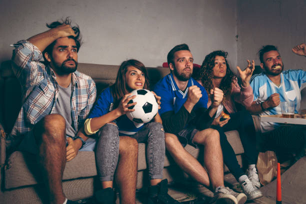 istock Watching a football match 1140988157