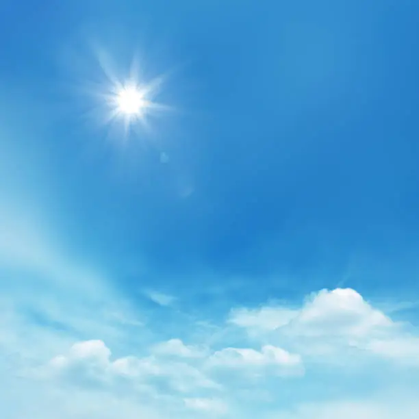 Photo of Blue Sky with Soft Clouds and Sun