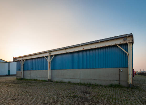 istock Old storage hall in an industrial area 1140990949