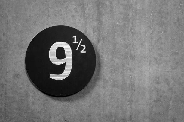 istock Number 9 ½ (9,5) on a gray concrete wall 1140994995