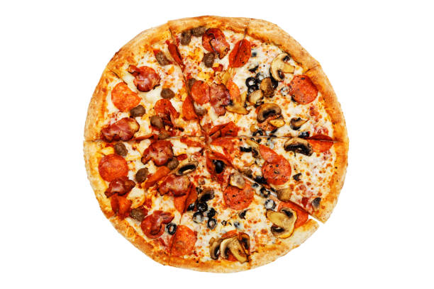 istock Closeup pizza with pepperoni and mushrooms isolated on white. 1140995154