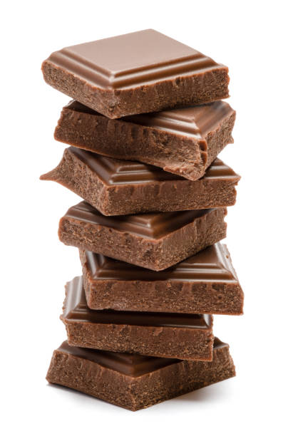 istock Milk organic chocolate pieces isolated on white background 1140996352