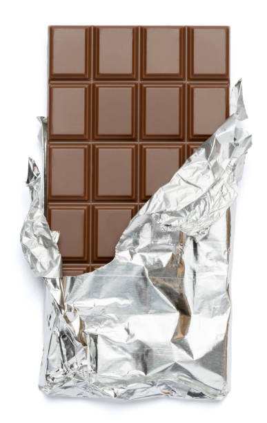 istock milk chocolate bar covered with foil isolated on white background with clipping path 1140996369