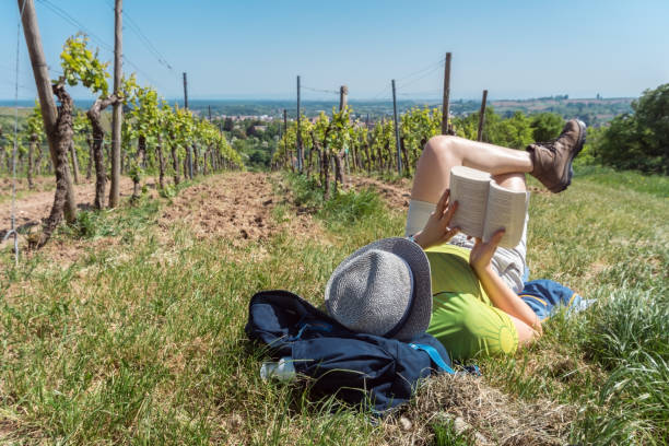 istock Woman having short break during long hiking 1140996638