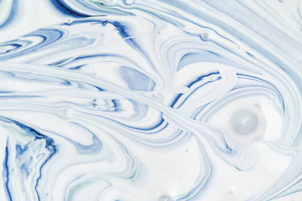 istock Abstract blank background for layouts. In the process of mixing white and light blue paint turns beautiful stains. Light photo. 1141001232