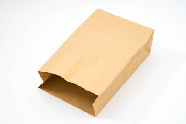 istock brown paper bag isolated on white background 1141002557