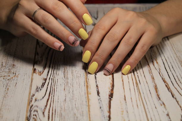 istock Beautiful woman's nails with beautiful christmas manicure 1141003114