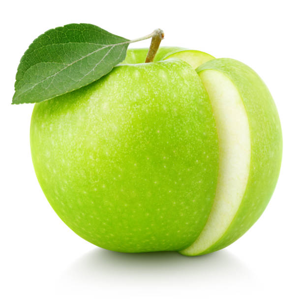 istock Green apple with leaf and cut isolated on white 1141004606