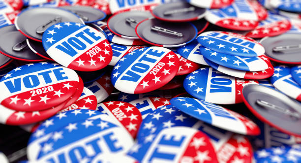 istock vote election badge button for 2020 background, vote USA 2020, 3D illustration, 3D rendering 1141006363