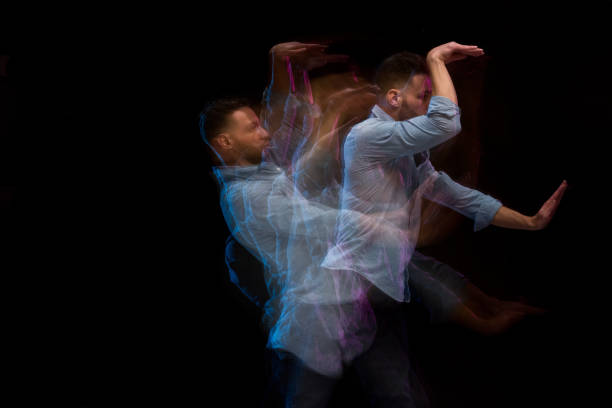 istock Handsome man in a blue shirt dancing 1141008303