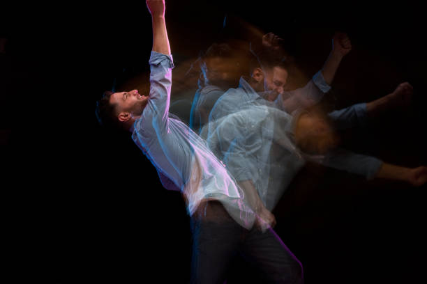 istock Handsome man in a blue shirt dancing 1141009148