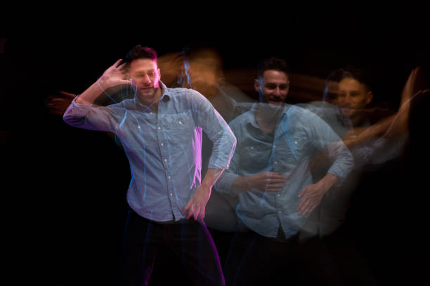 istock Handsome man in a blue shirt dancing 1141009163