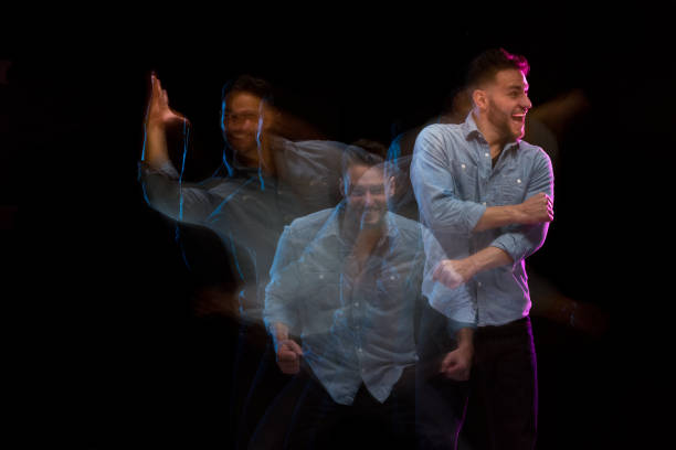 istock Handsome man in a blue shirt dancing 1141009268