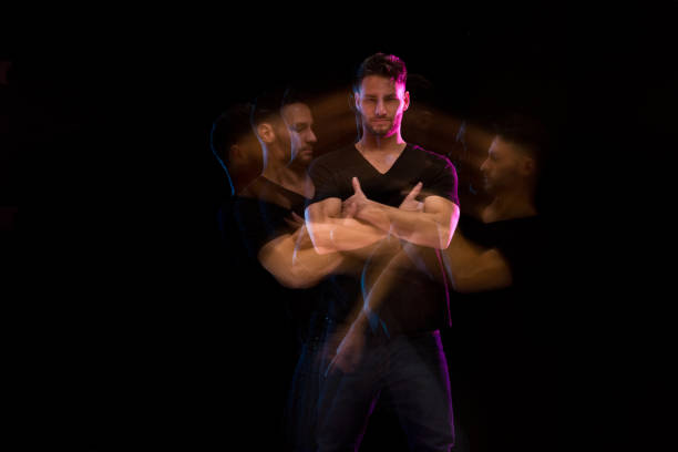 istock Good looking man in a black shirt dancing 1141009274