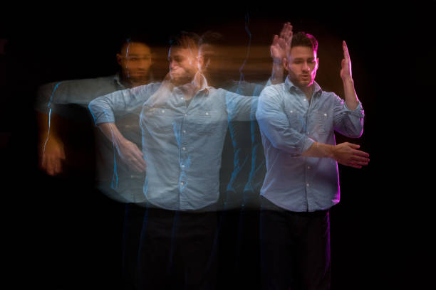 istock Handsome man in a blue shirt dancing 1141009343