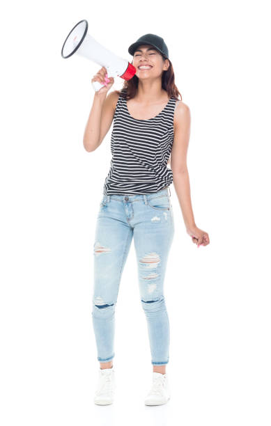 istock Cute latino female holding a megaphone 1141009777