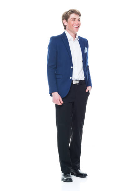 istock Handsome man holding a question mark sign and wearing a blue blazer 1141009998