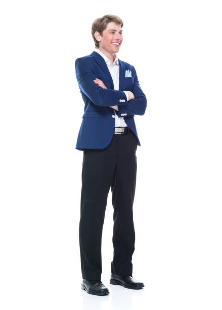 istock Handsome man holding a question mark sign and wearing a blue blazer 1141010228