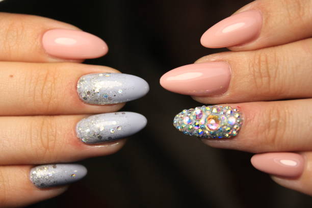 istock Beautiful woman's nails with beautiful christmas manicure 1141011121