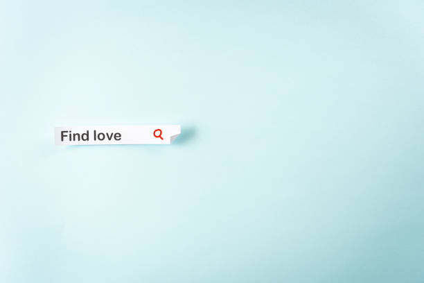 Concept for online internet dating blue background. Paper label like a web input form with the word "Find LOVE" and blank empty space for text. Concept for online internet dating blue background. Paper label like a web input form with the word "Find LOVE" and blank empty space for text. blind date stock pictures, royalty-free photos & images