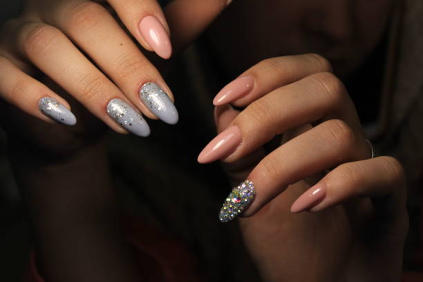 istock Beautiful woman's nails with beautiful christmas manicure 1141011649