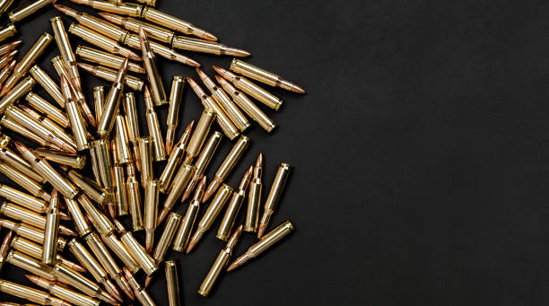 istock Rifle cartridges on a black background 1141012025