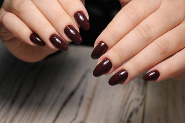 istock Beautiful woman's nails with beautiful christmas manicure 1141013670