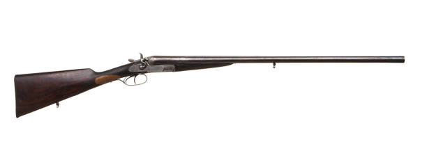 istock Vintage double-barreled hunting rifle isolated on a white background. 1141013777