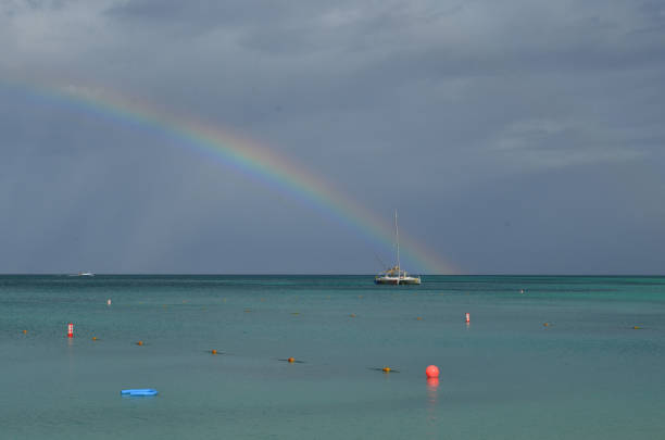 istock Rainbow Over the Ocean in Aruba 1141014030