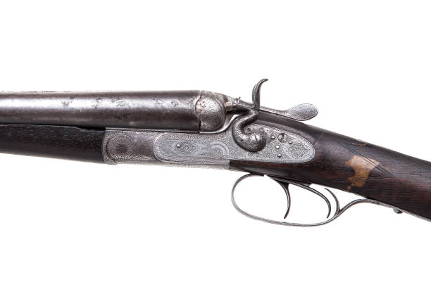 istock Vintage double-barreled hunting rifle isolated on a white background. 1141014052