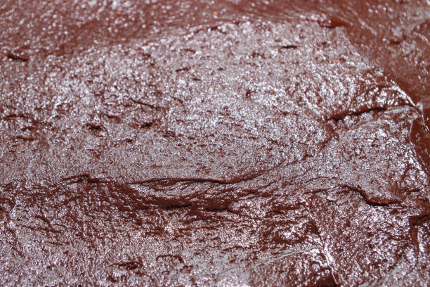 istock Prepared dough for dessert chocolate brownie before baking 1141015288