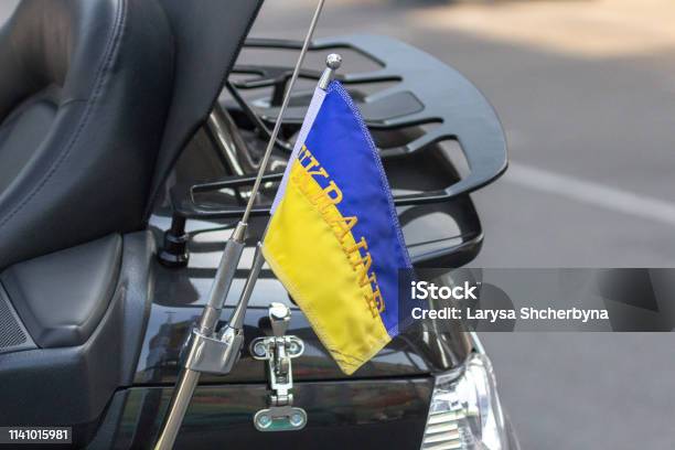 Flag Of Ukraine On A Motorcycle Traveling Biker Stock Photo - Download Image Now - Badge, Car, Decoration
