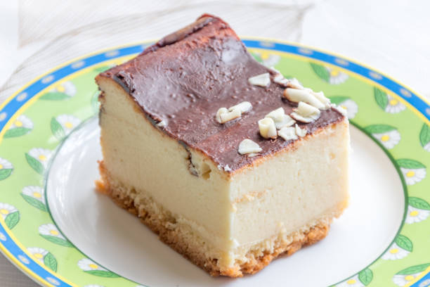 istock Slice of cheesecake with chocolate on the top. 1141018115