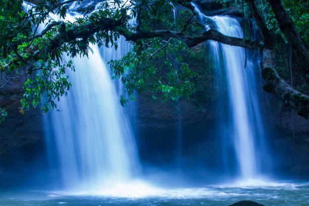 istock Picturesque tropical waterfall under the moonlight. 1141023078