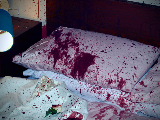 Murder Crime Scene (staged Fake theatrical blood used) Staged murder crime scene scene with blood splats and streaks across the walls and surfaces with dripping blood. Fake theatrical blood used. criminal activity stock pictures, royalty-free photos & images