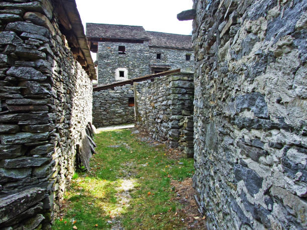 a typical old traditional architecture in the magic valley or valle di magia (valle maggia) - switzerland ticino canton valley church imagens e fotografias de stock