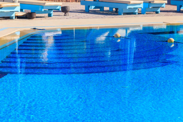 istock Swimming pool with clear water at a tropical resort 1141027977