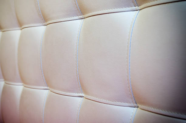 istock Tufted white leather headboard texture for background with vignette 1141029245