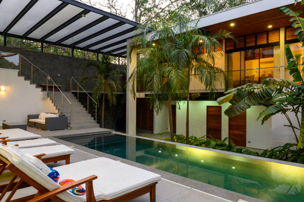 istock Modern luxury home at dusk 1141029503