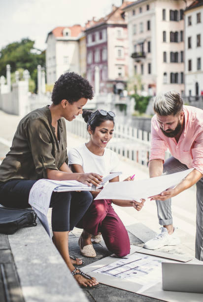 istock Young architects working on the street 1141029599